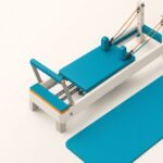 Che cos'è il Pilates: illustrazione isometrica di reformer, tappetino e magic circle, corsi di Pilates a Minusio e Locarno